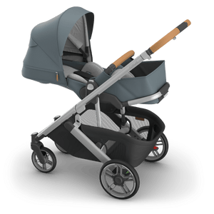 Callum UPPAbaby Cruz V3 Stroller - 3/4 Angle with Bassinet in Teal Blue, Silver Frame | Strolleria