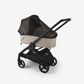 Black Mesh Bugaboo Butterfly Mosquito Net on Beige Carrycot - Side View | Strolleria
