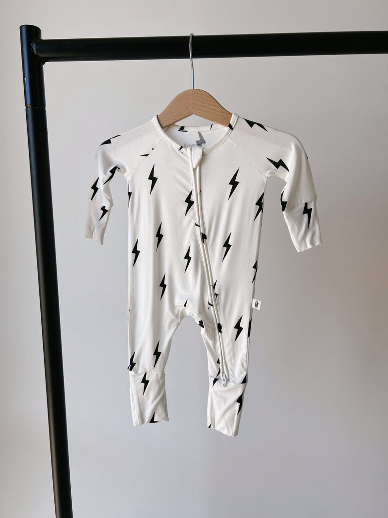 Forever French Baby - Bamboo Zip Pajamas | White & Black Lightning Bolt