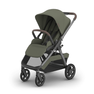 UPPAbaby Kona Stroller in Evelyn (Olive Green) with Tan Leather Handle - Hero 3/4 Left View | Strolleria