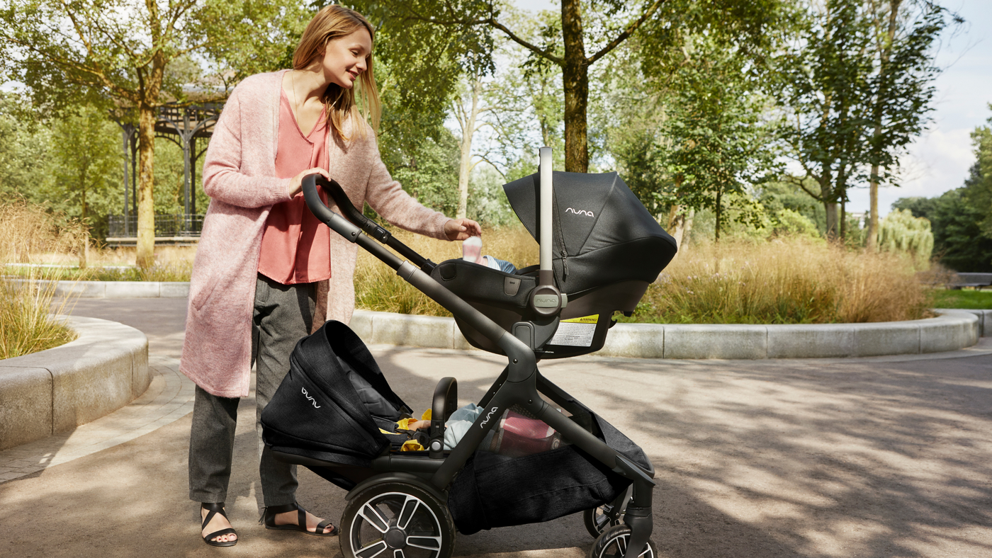 Mom Using A Nuna Demi Grow in Double Stroller Mode