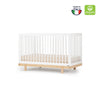 White Natural dadada Bliss 4-in-1 Convertible Crib - Side View | Strolleria