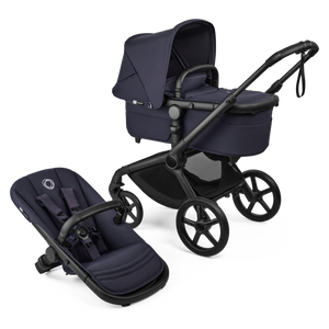 Deep Indigo Bugaboo Fox 5 Renew Bassinet and Seat Stroller with Black Frame - Side Angle | Strolleria