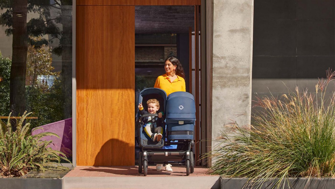 Mother Leaving Home with Her Two Children in A Bugaboo Donkey5 Duo Complete Stroller