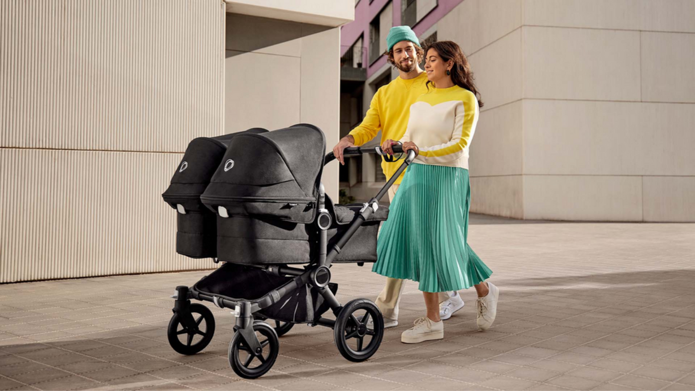 Parents Pushing Their Kids in A Bugaboo Donkey5 Twin Complete Stroller