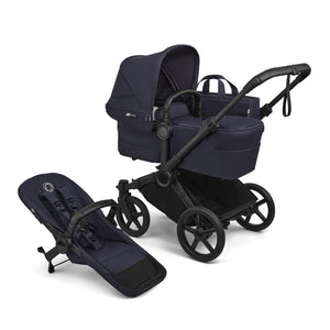 Deep Indigo Bugaboo Donkey 6 Single to Double Stroller with Bassinet and Toddler Seat - 3/4 View | Strolleria