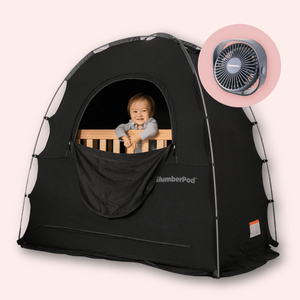 Black SlumberPod Blackout Sleep Tent with Mini Fan - Smiling Baby Standing in Playard, Front View | Strolleria