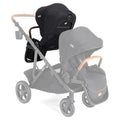 Black Joie Chive Sibling Seat Attached to Double Stroller - Side Angle | Strolleria