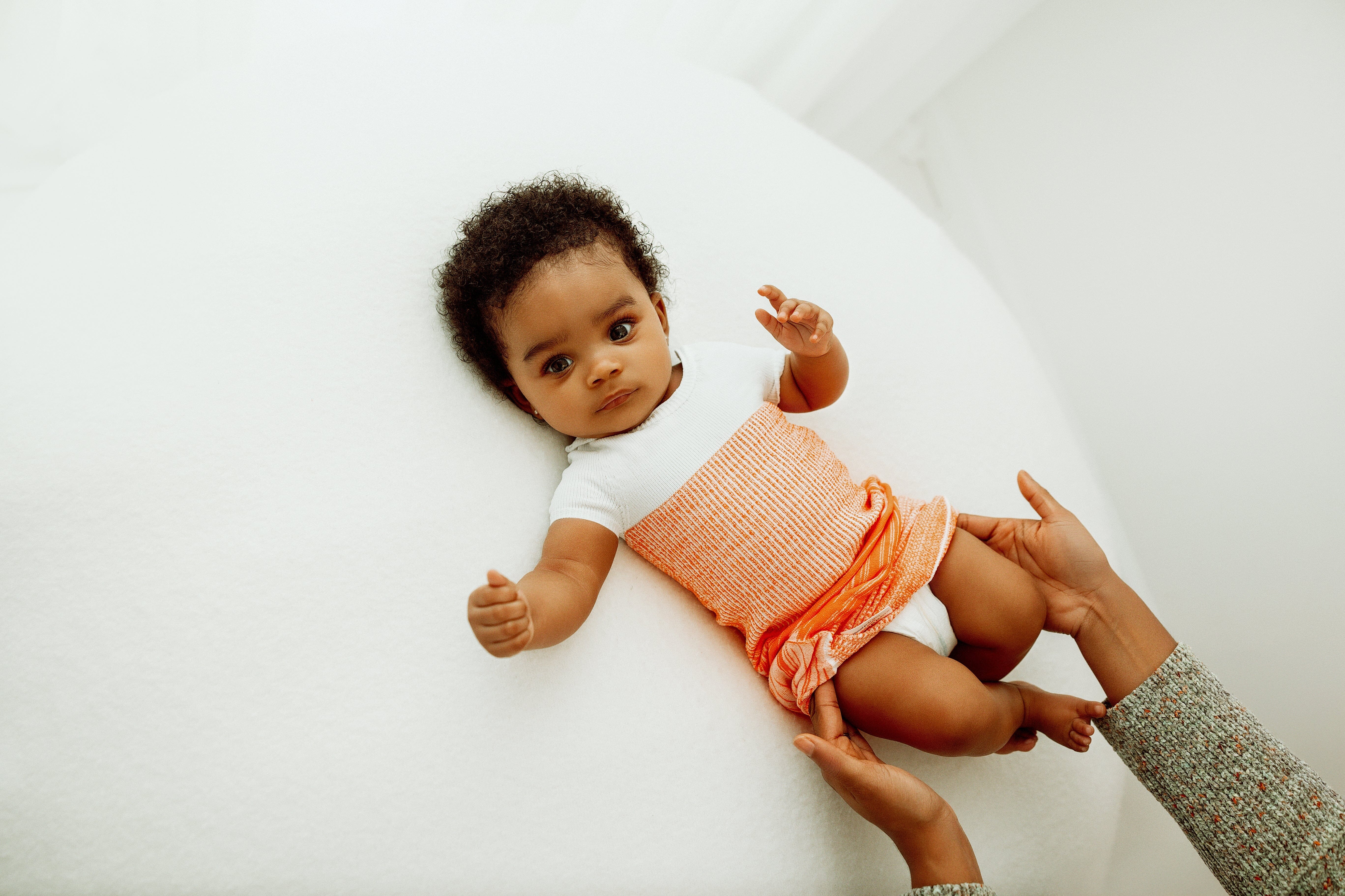 Swaddelini Orange Arms Out™ Short Sleeve Sleep Sack- Strolleria