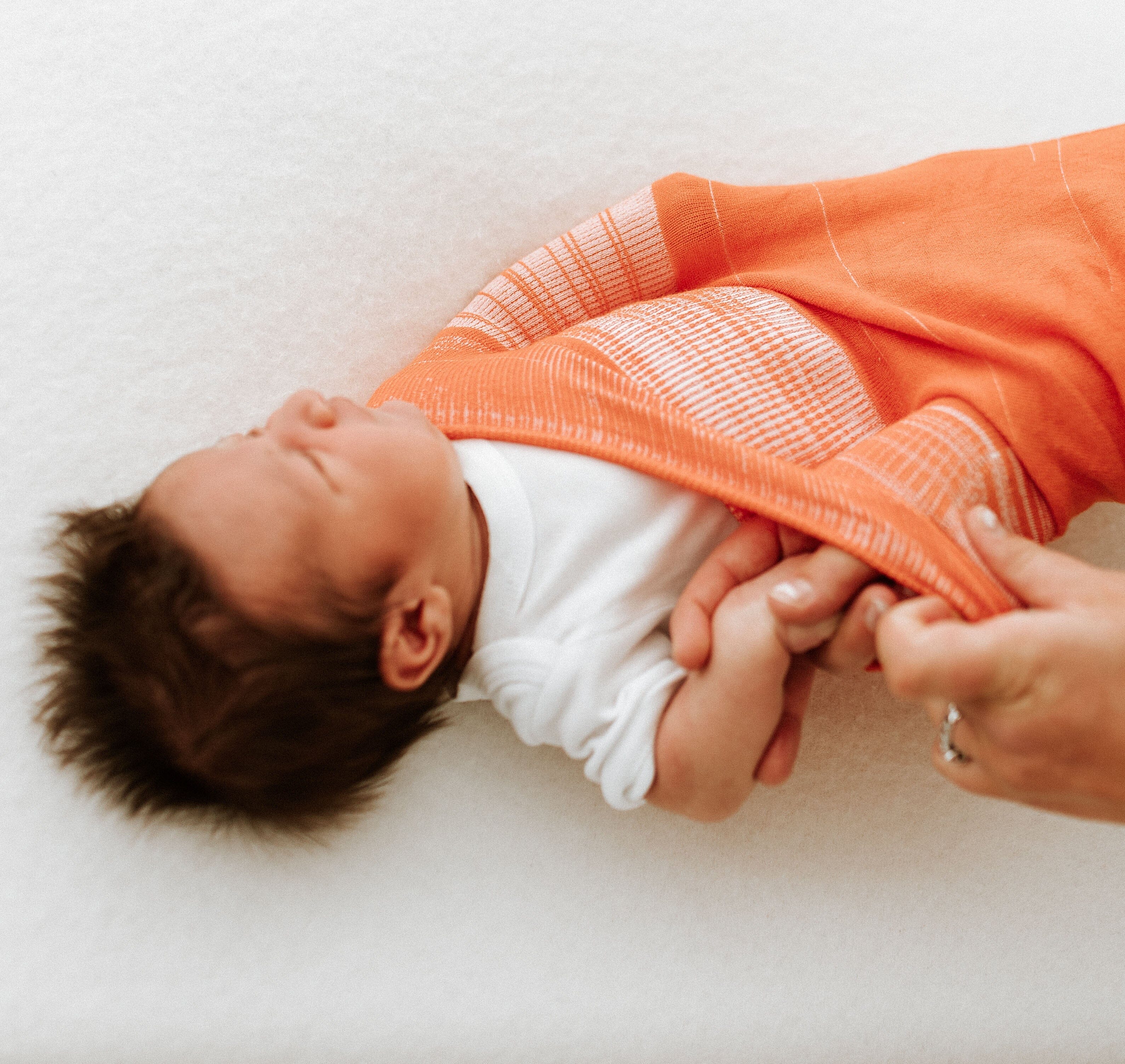Swaddelini Orange Swaddle Sleep Sack- Strolleria