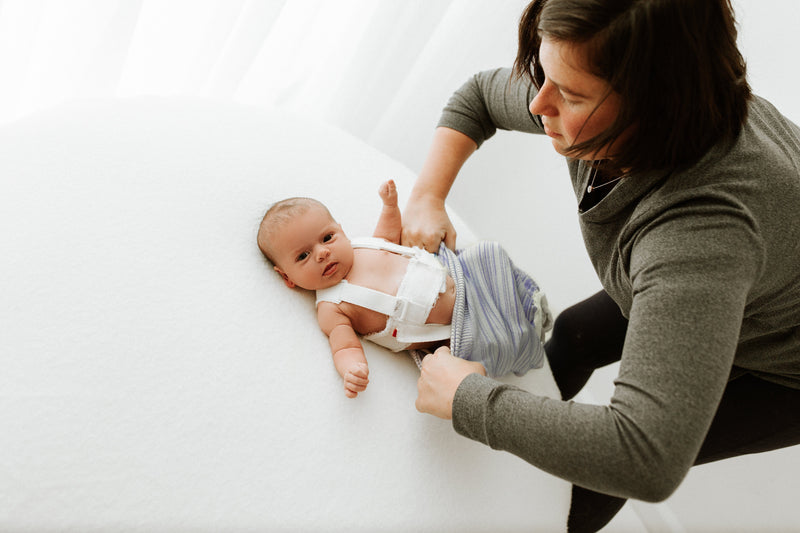 Swaddelini Baby with Brace Sleep Sack Swaddle Solution