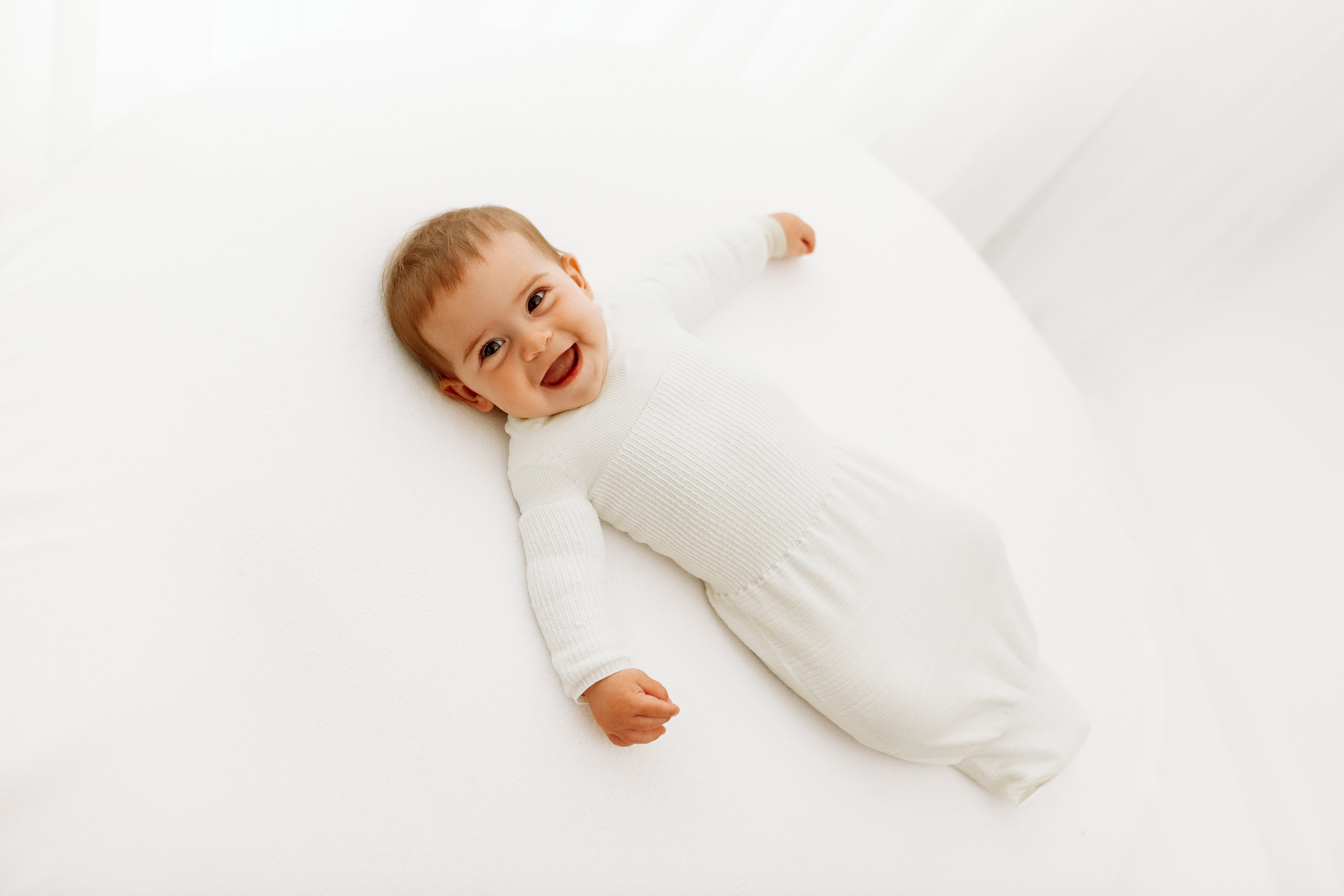 Swaddelini Bamboo Blend Cloud Arms Out™ Long Sleeve Sleep Sack- Strolleria