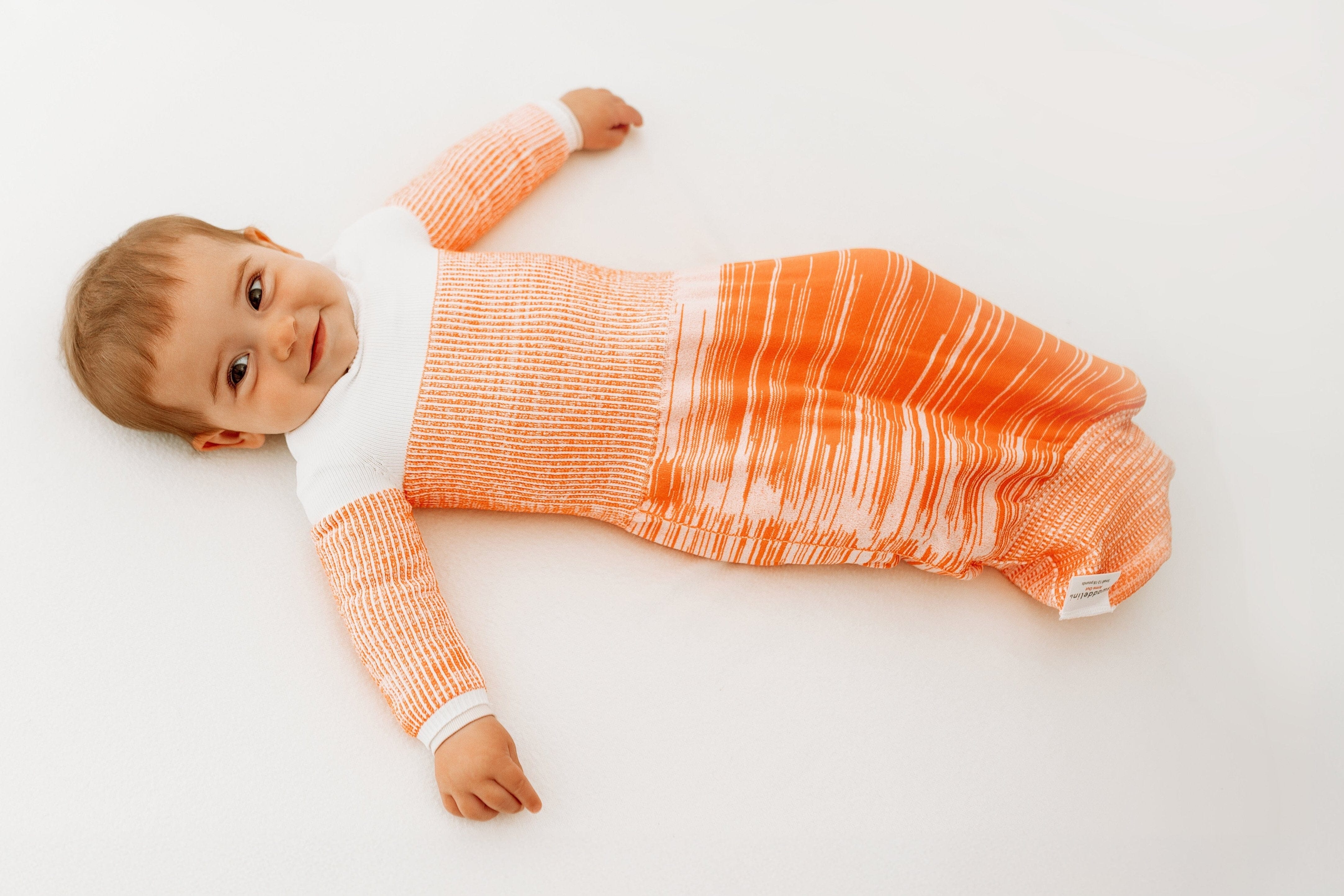 Swaddelini Orange Arms Out™ Long Sleeve Sleep Sack- Strolleria