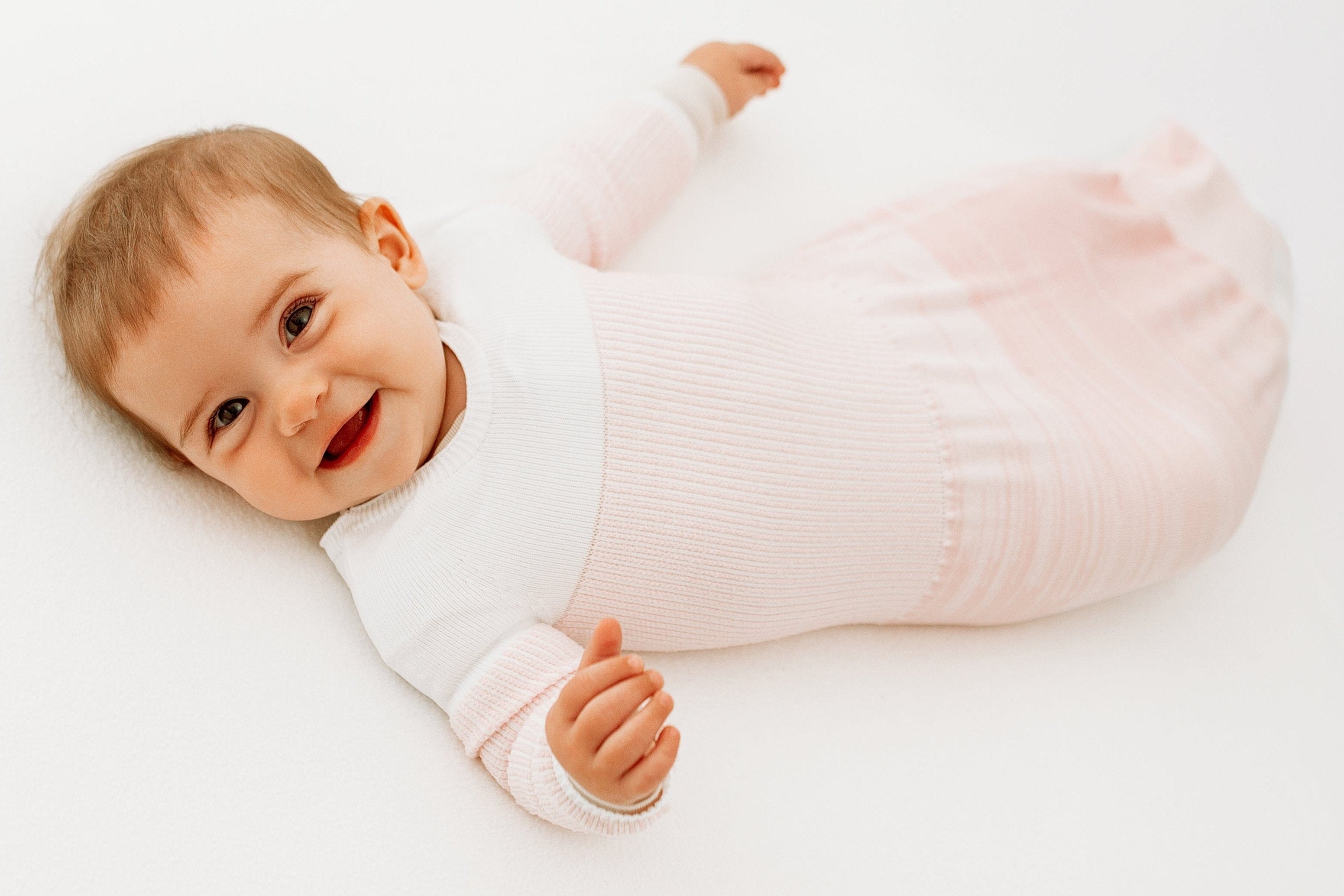 Swaddelini Pink Arms Out™ Long Sleeve Sleep Sack- Strolleria