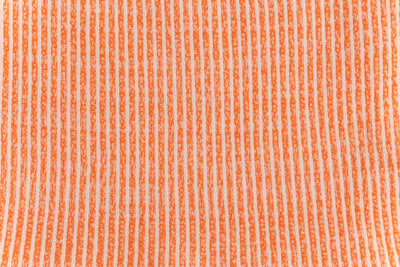 Swaddelini Orange Arms Out™ Long Sleeve Sleep Sack