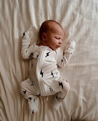 Forever French Baby - Bamboo Zip Pajamas | White & Black Lightning Bolt