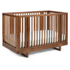 Walnut Wood Maxi Cosi Embraced Forms 4-in-1 Convertible Crib - Three-Quarter View | Strolleria