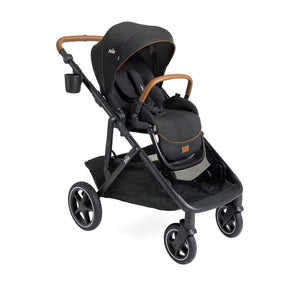 Shale Joie Chive Single to Double Stroller with tan handlebar and reversible seat - Three Quarter View | Strolleria