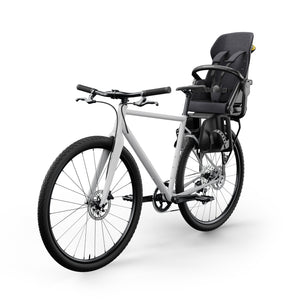 Charcoal Veer Switchback Bike Seat & Mount on White Bicycle - 3/4 Front Angle | Strolleria