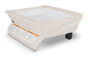 Cream UPPAbaby Remi Changing Station - Charlie Three-Quarter View with Padded Insert | Strolleria